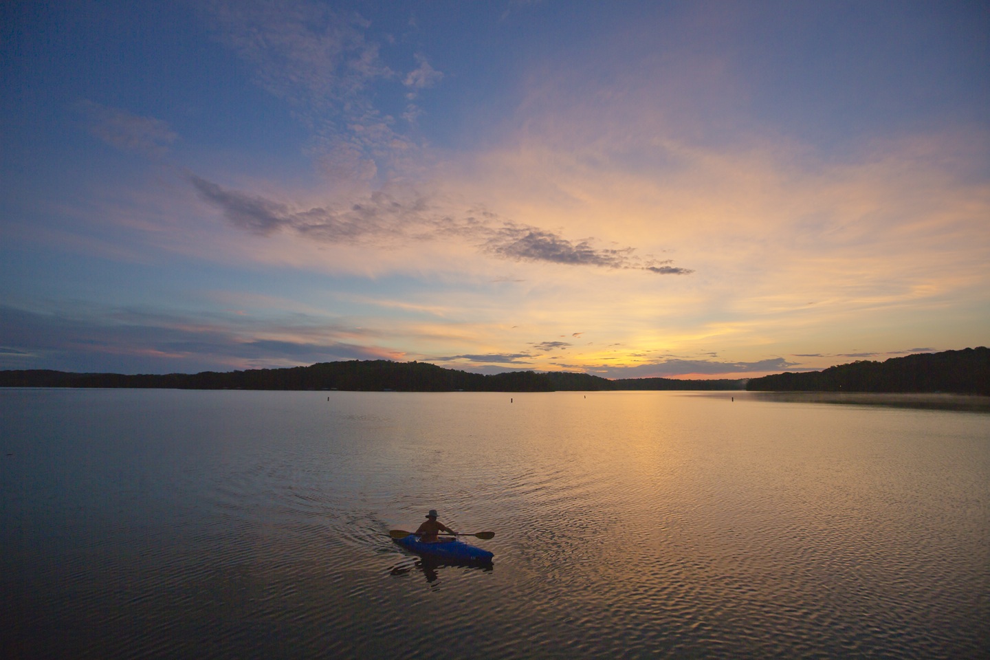 Kayaker silhouetted on Lake Hartwell